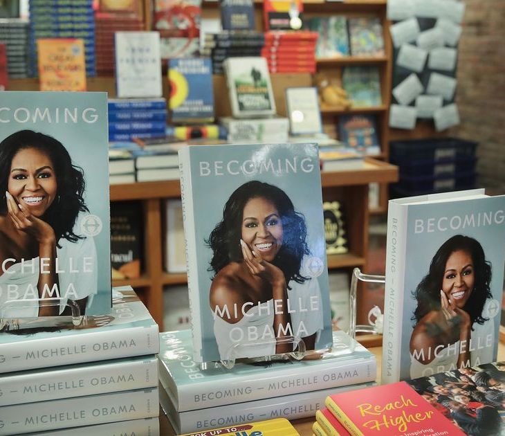 Becoming by Michelle Obama on a stand for sale