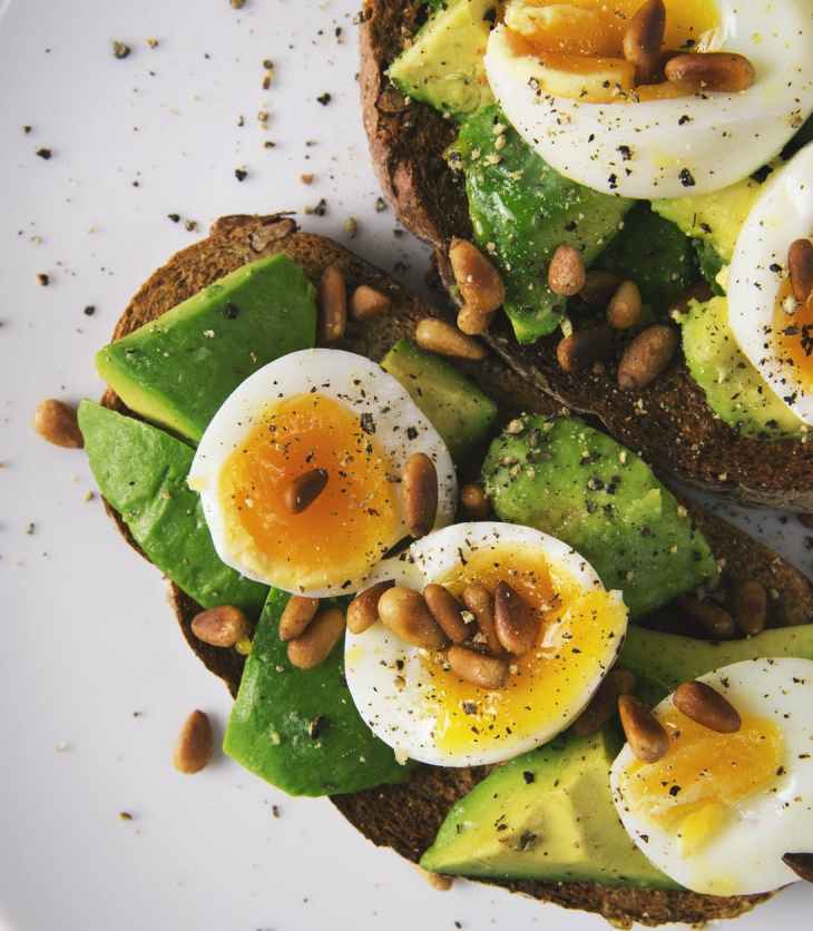 pastry and boiled egg snack on plate- 10 healthy snack swaps to try out